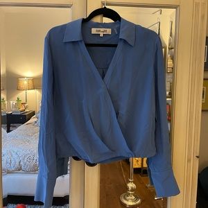 Diane von Furstenberg silk faux wrap top, size 6, color light blue.